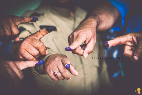 Issue Iraqis vote in parliamentary elections 