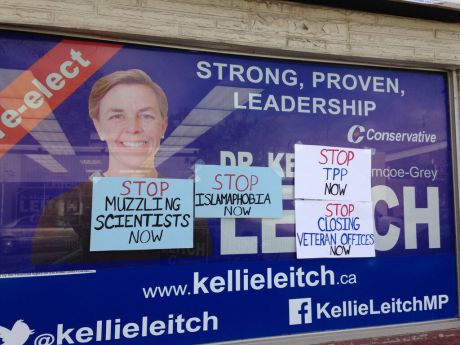 Issue Activists protest 'barbaric cultural practices' hotline at Kellie Leitch's office