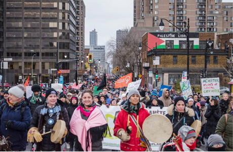 Issue 50,000 march in Montreal for urgent climate action