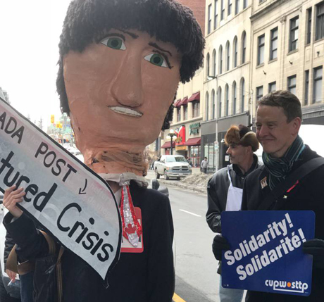 Issue Solidarity with postal workers builds across the country