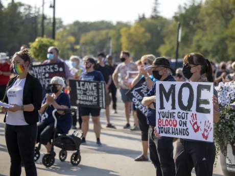 Issue Moe's horrible handling stokes pandemic in Saskatchewan